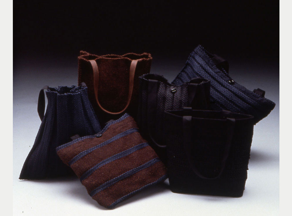 Winter handbags in rug wool and satin tape